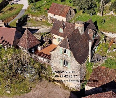 EXCLUSIVITY: On a height, delightful house of character, comprising: small barn/garage, large cellar, 2 terraces with lovely view of the VALLEE DORDOGNE and wooded garden of about 3000m2. Car parking. At the end of a hamlet with picturesque streets. ...