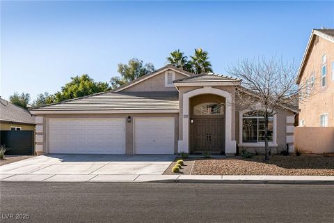 ABSOLUTELY STUNNING!!...Fully renovated single story with 3Bed/2 Full Bath *3 car garage* in the heart of Green Valley Ranch. Entrance flows into light & bright open concept floor plan with eye catching view to private resort style backyard w/sparkli...