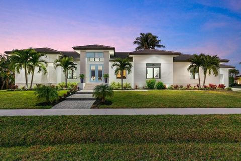 Welcome to your dream oasis in the heart of Marco Island. This stunning waterfront retreat, is a 3-bedroom, 3-full bath with den and office, and has roughly 2500 sq.ft. of luxurious living space that is perfectly blending modern elegance with coastal...