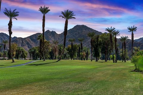 Expansive Mountain and Golf Course Views on Highly Coveted Indian Wells Lane! Rarely Available enjoy iconic Mid Century Modern architecture along the 14th Tee of Indian Wells Country Club Classic Course! Overlooking FABULOUS Views across four fairway...