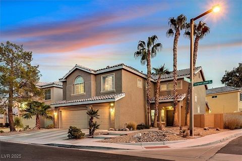 Look no further! Stunning 5 bedroom Summerlin home on corner lot with 3 car garage, pool, spa, and solar energy. Inviting entry to formal living room which is open to second level and formal dining room. Tall ceilings and large windows in living room...