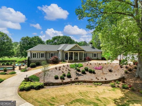 This home is getting some updates. Stay tuned for new photos. This is truly a one of a kind home that is a short stroll to the Chateau Elan Resort, Winery and Spa and a setting that is reminiscent of a European country estate. Located in a separate g...