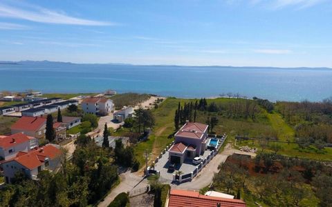 This wonderful new built property is a contemporary villa situated near the beach in Privlaka, in the Zadar region of Dalmatia, 100 meters from the beachline. At the moment it is 1st line villa, there is an empty land plot in front of it. Built in 20...