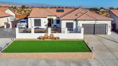 Welcome to this beautifully maintained 3-bedroom, 2-bathroom home in the heart of Thousand Palms, offering a perfect balance of style, comfort, and functionality. The Spanish-style exterior, with its charming tile roof and gated front courtyard, prov...