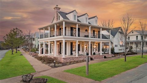 Gracing the corner of Boulevard and Ridgeline Rd, this beautiful colonial revival home complements its surroundings with deep wrap-around porches that encourages community connection and offers breathtaking views of the Pavilion and nearby trails. A ...