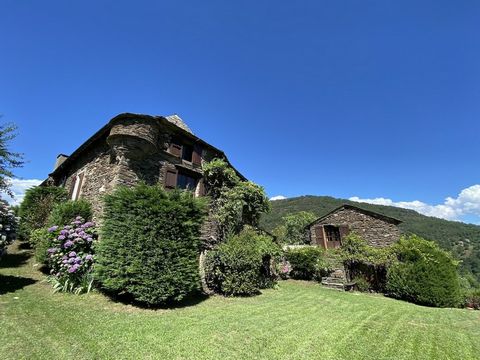 Summary Located in the south of the Lozère department, with its Mediterranean climate, mild winters and peaceful lifestyle in the heart of the historic Cévennes, and nestled in a lush green setting, this exceptional property stretches down to the Gar...