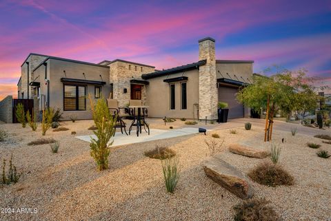 Welcome to your dream home in the heart of Sereno Canyon a premier Luxury Guard Gated Community in North Scottsdale! This breathtaking single-level Luxury home has it all! The spacious split floor plan with 3 upscale bedrooms boasts a gourmet kitchen...
