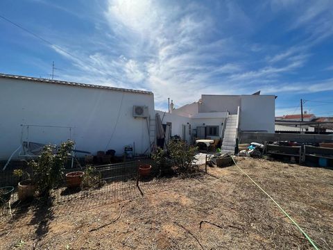 Rare opportunity to purchase a townhouse with two separate units on a 701 sqm urban plot, situated inside the beautiful village of Luz de Tavira, only a few steps away from the main church and all amenities like the daily veggie & fish market. The ma...