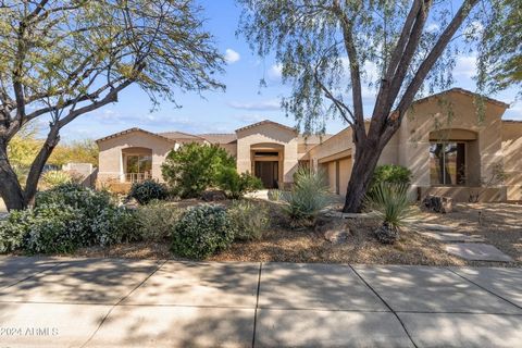 Welcome to your dream home in the prestigious gated community of Pinnacle at Grayhawk! This stunning 4-bed, 3.5-bath residence offers luxurious living with a fabulous floor plan. As you step inside, vaulted ceilings and expansive windows welcome you,...