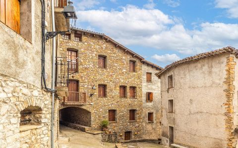 Rustic house of 317 m2 in the village of Erinyà, located in the region of el Pallars Jussà. It is located in the centre of the village and it has 5 floors, 6 bedrooms and 3 bathrooms. On the ground floor there is a natural stone wine cellar with spac...