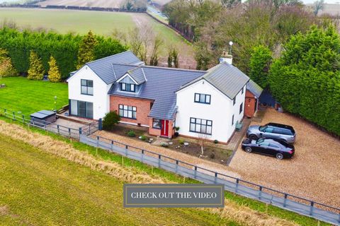 INVITING OFFERS BETWEEN £950,000-£1,000,000 ENJOY A SUPERB CONTEMPORARY LIFESTYLE IN THE COUNTRY WITH VIEWS OVERLOOKING THE VILLAGE. THIS HIGH SPECIFICATION PROPERTY OFFERS A STUNNING INTERIOR Situated just outside the village of Cherry Burton with v...