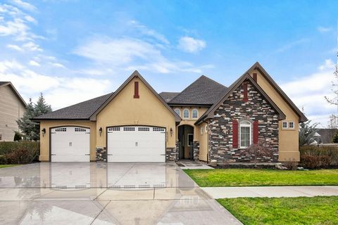Luxurious Custom-Built Home in Eagle Premier Syringa Community. 5000+ sf floor plan that lives like a single level on a prime 1/3rd acre corner lot with very rare daylight basement. The layout was expertly designed for everyday comfort w/grand, flexi...