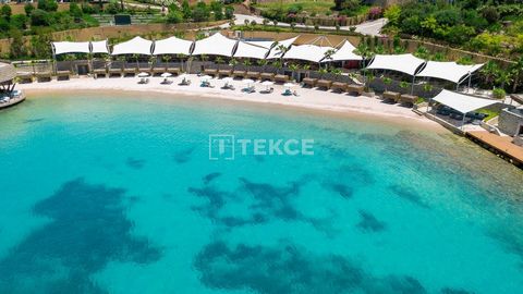 Appartamenti in hotel fronte mare a Adabucco, Bodrum. Gli appartamenti ad Adaboko fanno parte di un progetto alberghiero. Il progetto ha la sua baia, molo, piscina, palestra, centro benessere, ristorante e cinema all'aperto. BJV-00056 Features: - Air...