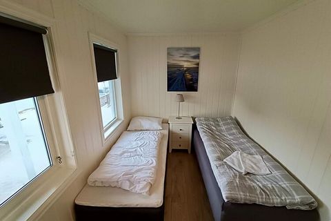Great fisherman’s cabin right by the coast with several good fishing spots, great service! Perfect for sport & hobby fishermen, as well as larger groups when also using holiday home 08811. Outside the cabin, there are several sun terraces in beautifu...