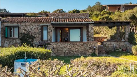 A few steps to the sea, stone villa with veranda, garden, two bedrooms, aircontioned, 24/7 concierge and security for sale in San Teodoro, Sassari. In one of the most evocative settings on the northeastern coast of Sardinia, Punta Molara is an elegan...