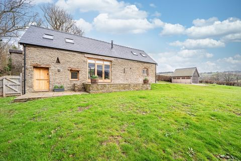 Set amidst beautiful rolling countryside and yet within a few minutes’ of the popular village of Longtown which straddles the English/Welsh border. An imaginatively converted traditional former agricultural stone barn with much character and interest...