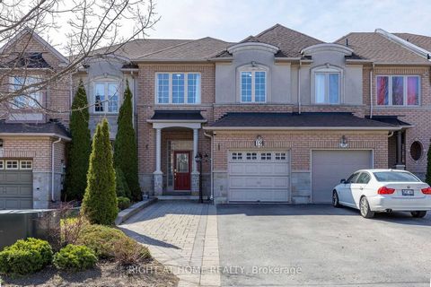 Spacious, sun filled and south exposure -living space townhome nested in prestigious area of Thornhill Woods community! There are 9 reasons you must fall in love with this fantastic family home: (1) No sidewalk, extended interlock enlarge the parking...