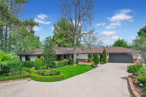 Nestled on the lush hills of La Canada Flintridge, this single-story house has a private gate with stunning mountain views on the half-acre lot. Leading from a private driveway, the iron gate and the full boxwood hedges give this home more seclusion,...