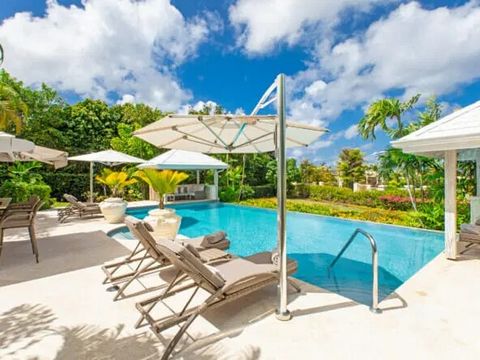 Fig Tree House is a truly spectacular four-bedroom villa and accompanying two-bedroom guest cottage, set amongst an acre of lush tropical gardens on the renowned Royal Westmoreland Estate. A wide, sweeping driveway greets you on arrival, leading to t...