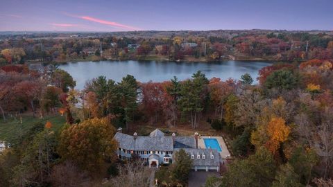 Rare opportunity to obtain an award-winning lakefront home on privately-owned Sunfish Lake. This home underwent a massive whole house makeover retaining its original flare with a large addition. Enjoy complete privacy on an 8.94-acre premier lot, wit...