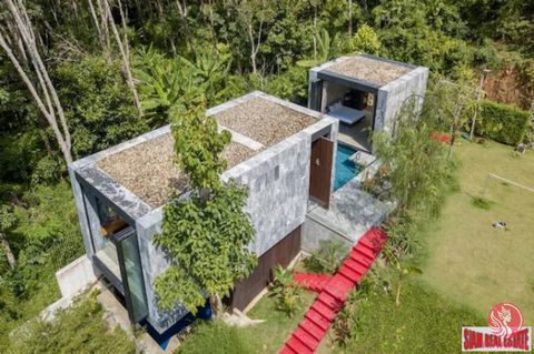 Nestled in the hills above the Kamala valley on Phukets west coast, just 5 minutes drive to the beach. The design is bold and modern. High ceilings, natural stone exterior walls and a combination of polished concrete walls, stone and ceramic mosaic t...