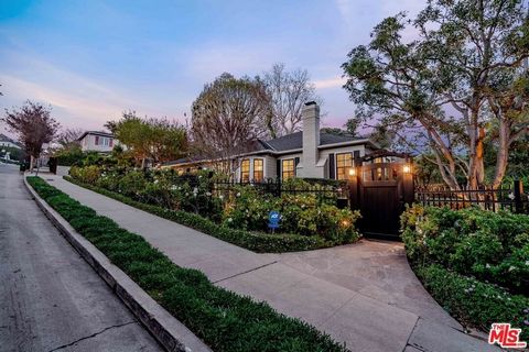 Here is what you have waited for.....A Westwood Hills' gem, done to the 9s. Hard to find, gated single-story property, surrounded by lush gardens, and has a fantastic curb appeal. This home has been in the family for almost 25 years, preciously loved...