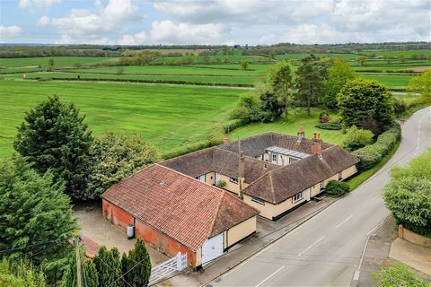 Step inside this delightful, single-story house which desirably flows in a circular motion around an attractive central courtyard garden. The Grade II listed property boasts a beautifully presented country style kitchen/breakfast room with AGA, adjac...