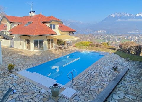 Located in Saint Jorioz, this house was built in the 2000s with high-end features, offering approximately 310 m² of living space spread over three levels. Set on a 2993 m² landscaped plot on the heights of Saint Jorioz, it boasts a panoramic view of ...