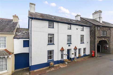 This substantial seven-bedroom Grade II period home sits in the heart of the charming Carmarthenshire town of Llangadog. Offering versatile accommodation, it's perfect for a large family or those looking to generate an income from the existing self-c...