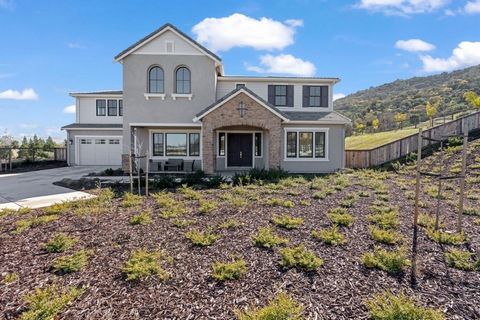 This stunning brand-new estate combines luxury, space, and privacy in an exclusive community of just 8 homes on a peaceful cul-de-sac. Set on a sprawling 1-acre lot with breathtaking hill and city views, this 5,606 sqft home offers the finest in mode...