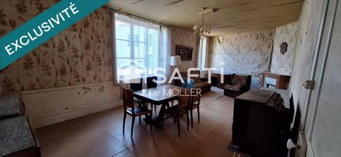 Maison à rénover avec garage et terrain