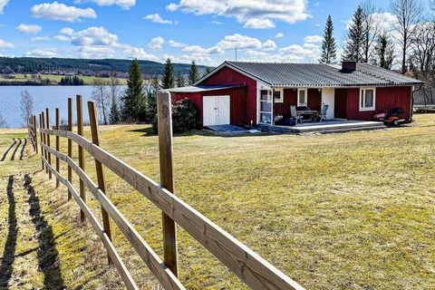 Cozy cottage with fabulous views! When you turn off road 240 and drive through the cozy cottage area, you quickly notice how the view becomes more and more beautiful. Once at the cottage, the meadows and the lake pour out and you get a wow feeling ab...