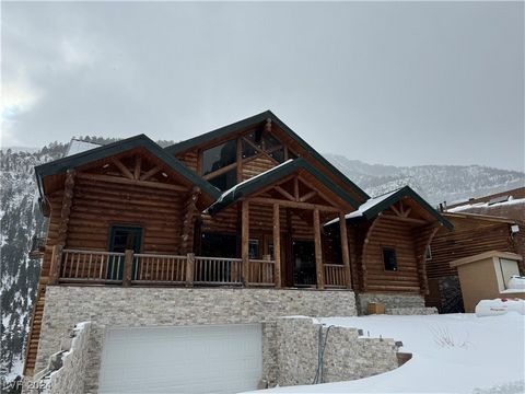 Welcome home to Mt. Charleston!! This new 4 story custom home has majestic views of the mountains! The home has many custom features. Great room with a custom fireplace, open to the dining and kitchen area. And on the main floor there are also 2 bedr...