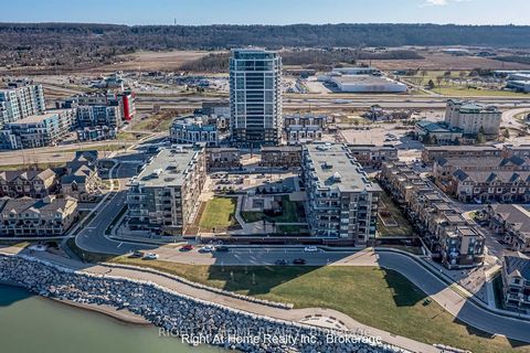 Waterfront Resort Living! Strategic Location: Mins to QEW, Shopping, Restaurants, Beaches, Conservation Areas, Parks, Proposed Future Grimsby GO Station, Wine Country and more; Within 30 mins Drive to Hamilton/Niagara Falls! Very Bright & Beautiful W...
