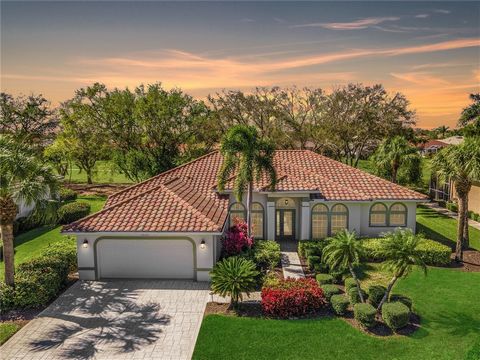 EXCEPTIONAL QUALITY ESTATE HOME located in Lely Island Estates, a small enclave in beautiful Lely Resort, home to 3 championship golf courses! This residence has views of the Flamingo Golf Course hole #2 from the private oversized caged pool & lanai ...
