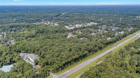 5 acres on 278 in Bluffton. Close to Simmonsville Road. Great location for hotel, apartments, gas station, grocery store, etc... The wooded area beside The Pines nursing home. Nursing home is not part of the sale.