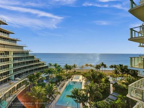 Exquisite residence offering floor-to-ceiling impact glass windows providing breathtaking views of the Ocean, Intracoastal & City of Ft. Lauderdale from every room. Experience a chef's designed kitchen feat. quartz countertops w/large Sub-Zero wine s...