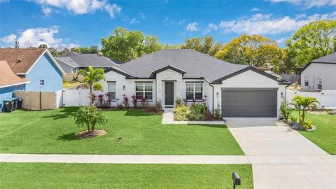 Better than New! Here's your chance to have a BRAND NEW home with all the upgrades but without the wait!! Eastern Home's Canary model features a stone front entrance, 4 bedrooms and 2 baths, tray ceilings with crown molding, three-panel 8' sliding do...