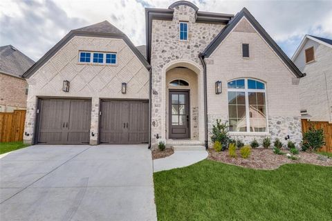 STUNNING BRAND NEW Britton home, Boasts 5 bdrms, 4.5 modern bths, 3 car tandem garage in highly sought after The Tribute Lakeside and Golf Resort Community. Immediately notice huge glass french doors leading into study, providing an elegant touch. No...