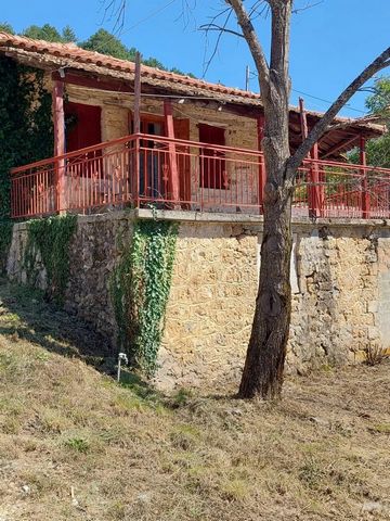 The house consists of an underground storage room, an elevated ground floor which is the main house, 80sqm. with fireplace, a garden of 240sq.m. and a plot of 230sq.m. where there is also a storage room. The price for the house, the plot and the ware...