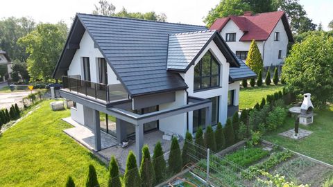 ALL IN ONE NIERUCHOMOŚCI presents a new, detached, spacious single-family house for sale located in one of the most beautiful districts of Krakow in Wola Justowska. Total area of the house:272m2 | Usable area 187m2 Land area: 800 m2 The house is in a...