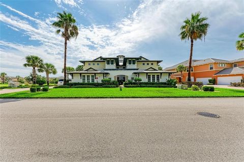 Enjoy waterfront living in this bright, beautifully finished, 3-bedroom carriage-style home located at The Lagoon, a prestigious 24-hour guard-gated community in desirable Tidewater Preserve on the Manatee River - one of the finest boating communitie...