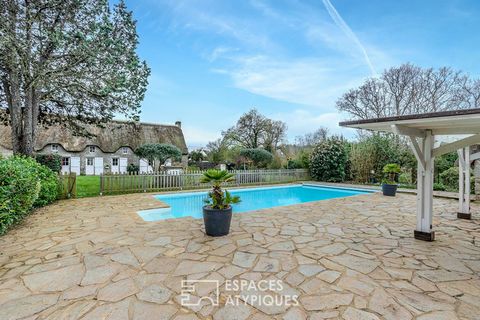 This exceptional property with preserved authenticity, is located in the heart of a hamlet in the Marais Briéron, a stone's throw from the shops of the Madeleine de Guérande. It comprises 3 buildings with a total floor area of 560.7m2 spread over a d...