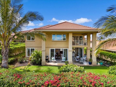 Experience the epitome of luxury living within the highly desirable Hokulani Golf Villas gated community. The sprawling 40-acre complex is graced with abundant green spaces and a lavish infinity pool, clubhouse, and barbecue areas. This stunning 4-be...