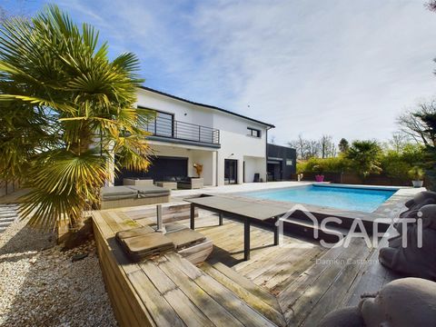 In a quiet area, 5 minutes from the city centre of Saint-Aubin, come and discover this very beautiful recent house, very bright, with very spacious rooms and quality equipment. On the ground floor: Large living room with open-plan kitchen (>100m²), p...