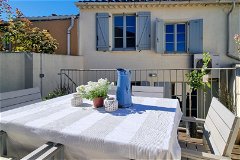Charming 3-bedroom townhouse located a stone's throw from the Castle gates, featuring a terrace, garage, and income potential. Situated in a fantastic location with views of the UNESCO listed Carcassonne castle, this gem of a house has been fully ren...