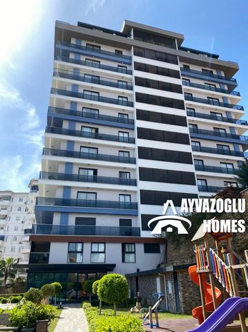 1+1 furnished apartment in a new complex in Tosmur. An apartment with an area of 115 m2 with a 2+1 plan in a new residential complex in Tosmur is for sale. The layout of the apartment consists of 2 bedrooms and a living room combined with a kitchen. ...