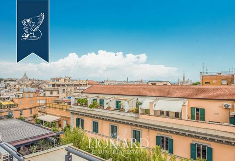 This elegant penthouse with a panoramic view is currently up for sale in a prestigious period building situated in the heart of Rome. This luxurious property encompasses three floors, three vast terraces, including a 50 m² panoramic one with a 360-de...