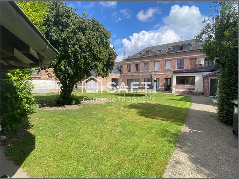 CHRISTELLE TROGNEUX Safti real estate offers you in the heart of Doullens, this spacious Bourgeoise & bright house offering you a peaceful and green living environment. It enjoys an ideal location for families looking for tranquility while staying cl...