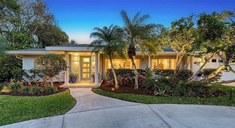 Discover an idyllic retreat in Sarasota's sought-after Harbor Acres, where this updated 3BR/3.5BA single-story home epitomizes a refined tropical lifestyle. Renovated beginning in 2020, including a new roof and central air, this move-in ready home st...